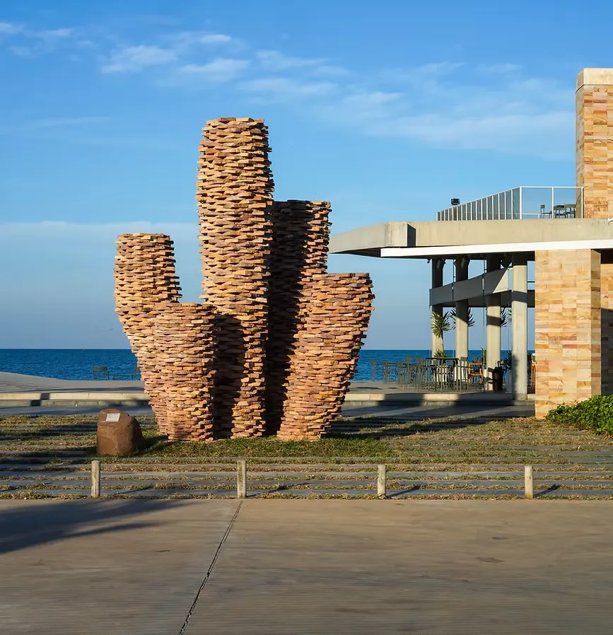 Brick sculpture by the sea at Kep West